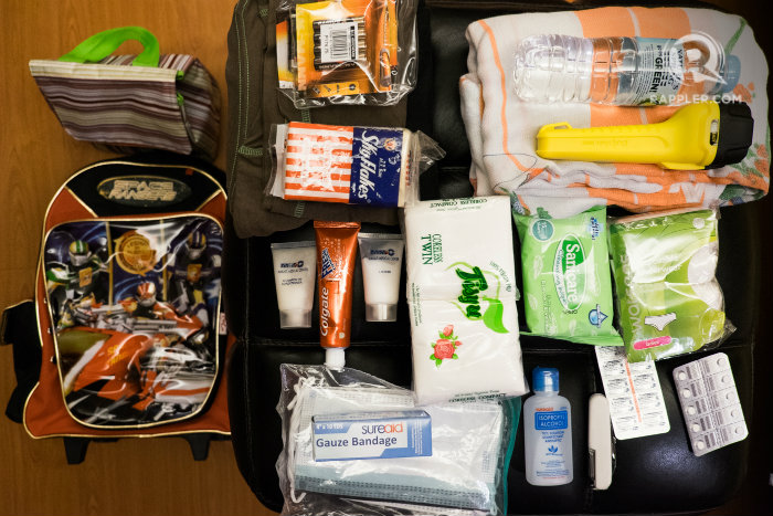 EMERGENCY. Some of the contents of Gloria Rayos' emergency bag, which is ready at home in case of an earthquake. All photos by Pat Nabong/Rappler  