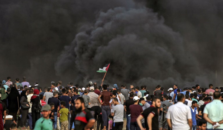 BORDER PROTEST. In this file photo, smoke from a tire fire rises as Palestinians protest near the border with Israel east Gaza City on July 13, 2018 against the expropriation of Palestinian land by Israel. Photo by Mahmud Hams/AFP 