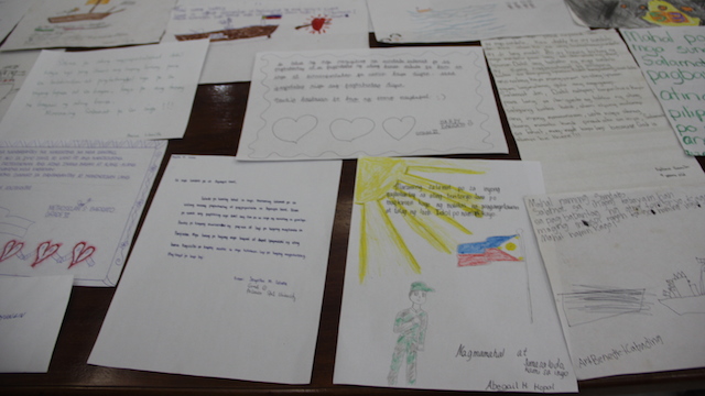 WORDS OF ENCOURAGEMENT: Students write letters for the troops in Ayungin Shoal. Photo from Western Command