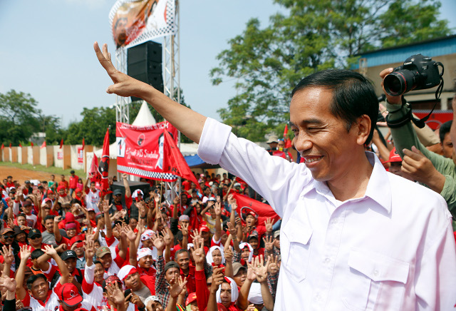 YOUR ORDINARY MAN. This is the image of grassroots leader Jakarta Governor Joko  Widodo.