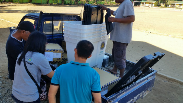 DELIVERY. Vote Counting Machines are delivered at Luis Tembrevilla Elementary School in Hinoba-an, Negros Occidental on May 6. Image courtesy Aldrin Casinas / Rappler  