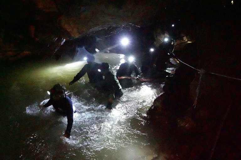 RESCUE OPS. This photo taken and released by the Royal Thai Navy on July 1, 2018 shows Thai Navy Seals navigating a flooded section of Tham Luang cave at the Khun Nam Nang Non Forest Park in the Mae Sai district of Chiang Rai province. File photo by Royal Thai Navy  