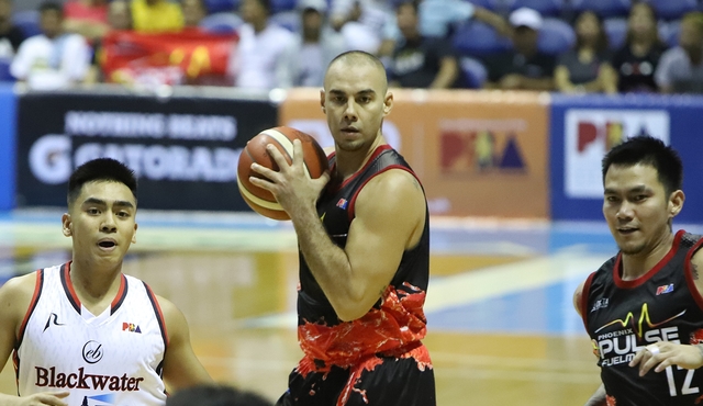FAREWELL. Doug Kramer plays his final PBA game, helping Phoenix end the season on a high note. Photo from PBA Images  