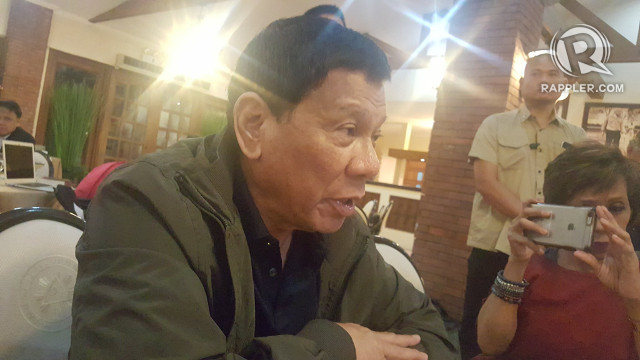 'NO INVASION.' President Rodrigo Duterte, over dinner with media on August 21, 2017, answers questions about Sandy Cay and the presence of Chinese ships there. Photo by Pia Ranada/Rappler  
