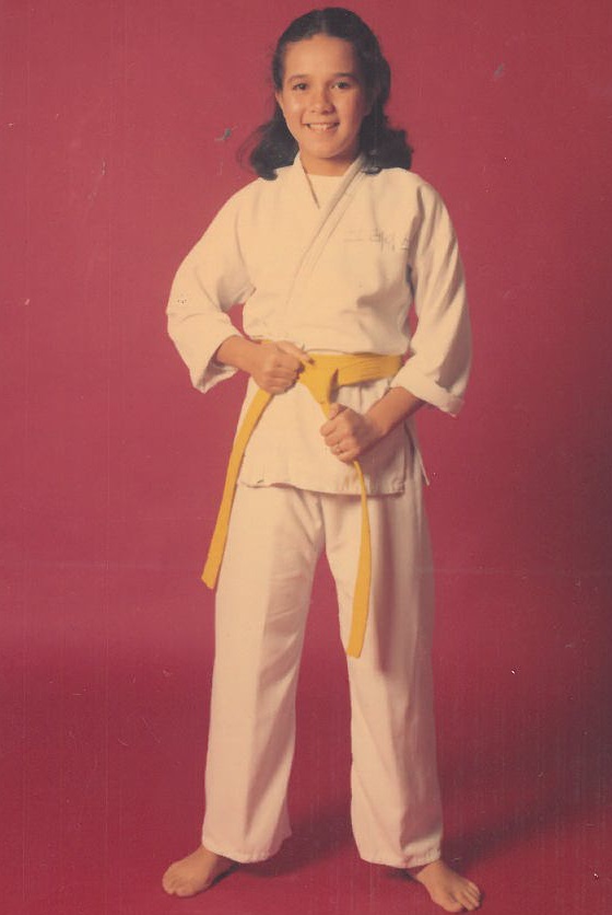 SPORTS. A smiling Poe with a yellow belt. She eventually became a black belter. Photo by Office of Sen. Grace Poe. 