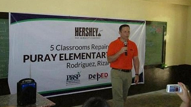 5 CLASSROOMS REPAIRED. The Hershey Company general manager for Asia South, Matt Andersen, leads the turnover ceremony of the 5 repaired classrooms in Puray Elementary School. Photo from Hershey's