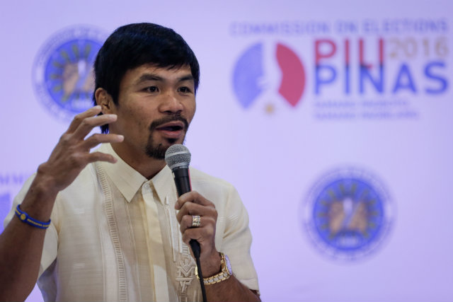 GOLD HUNT. Manny Pacquiao, seen during his Senate proclamation on May 19, could bring star power to the Philippines' Olympic delegation. Photo by Mark Cristino/EPA 