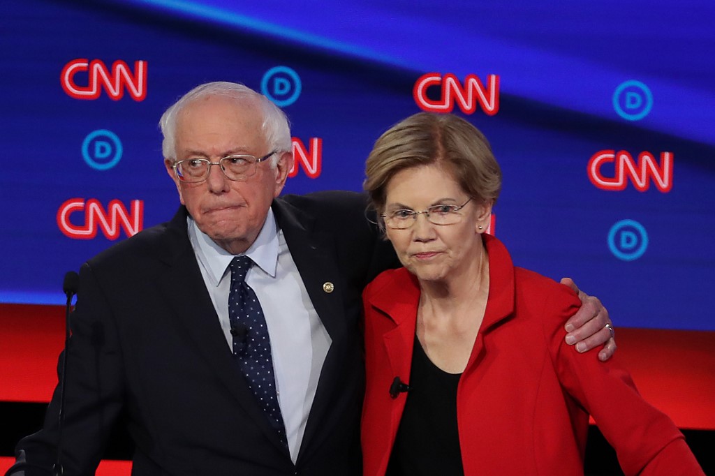 LIBERALS. Democratic presidential candidate Senators Bernie Sanders and Elizabeth Warren after the Democratic Presidential Debate at the Fox Theater July 30, 2019 in Detroit, Michigan. Photo by Justin Sullivan/Getty Images/AFP  