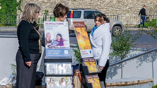 BANNED. File photo shows members of Jehovah's Witnesses on a street stand near in Lviv, Ukraine. Shutterstock 