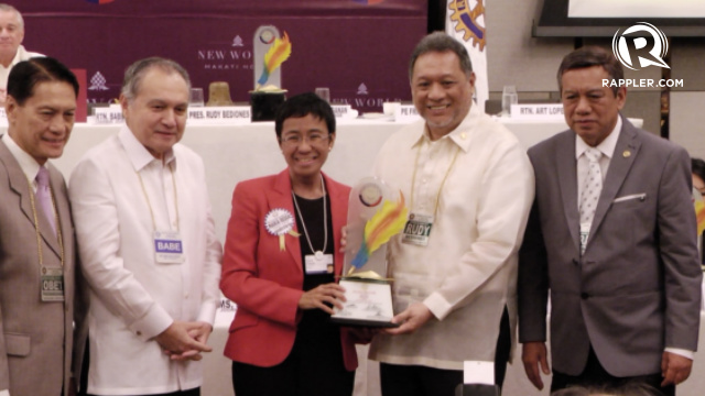 JOURNALIST OF THE YEAR. Rappler CEO Maria Ressa receives her award from the Rotary Club of Manila. Photo by Rappler