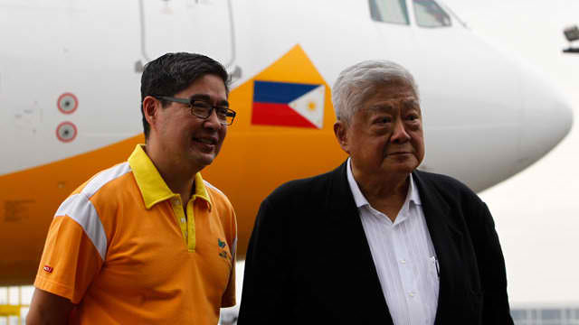 ALMOST 50%. The increase in JG Summit's net income is due to the growth in airline and petrochemical revenues. In the file photo are John Gokongwei Jr (right) and son Lance (left).  