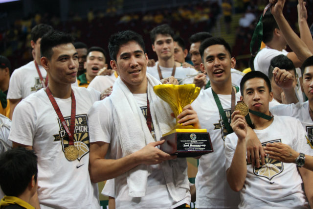Mac Belo of FEU had to be carried off the court due to cramps in the fourth quarter, but not before putting the Tamaraws ahead for good. Photo by Josh Albelda/Rappler 