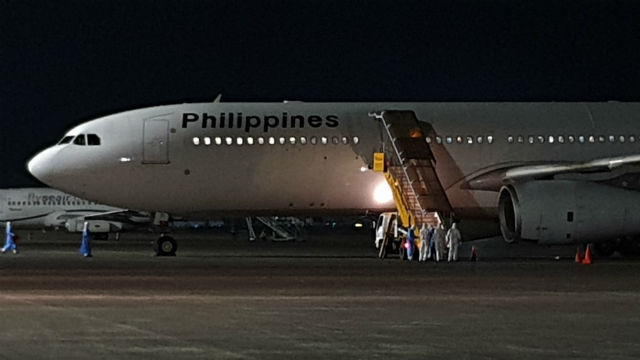 FINALLY HOME. The Philippine Airlines plane caryying the first batch of Filipino repatriates from M/V Diamond Princess arrives in Clark Airbase on February 25, 2020. Photo from the Department of Foreign Affairs  