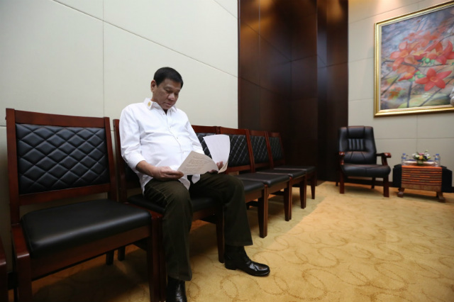 CHIEF DIPLOMAT. Philippine President Rodrigo Duterte reviews inside the ASEM Villa for the ASEAN Summit in Vientiane, Laos, on September 6, 2016. Malacañang file photo   