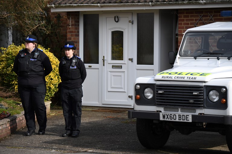 POLICE. British Police Community Support Officers stand on duty outside a residential property in Salisbury, southern England, on March 6, 2018, believed to have been cordoned off in connection with the major incident which started at The Maltings shopping center in Salisbury on March 4. File photo by Chris J Ratcliffe/AFP  