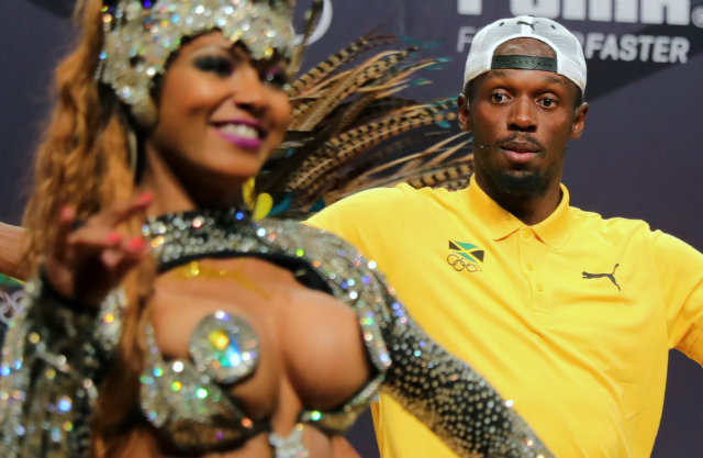 BOLTED. Jamaican sprinter Usain Bolt takes in the sights of Rio during what he says will be his Olympic swansong. Photo by Michael Kappeler/EPA 