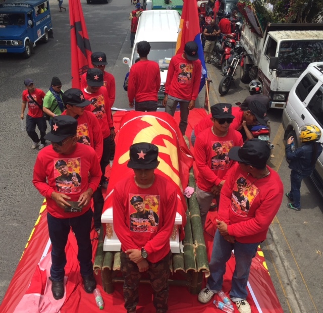 FUNERAL MARCH. A funeral march for communist army leader Leonardo Pitao is given the greenlight by Duterte in Davao City on July 10, 2015. Photo by Editha Caduaya/Rappler 