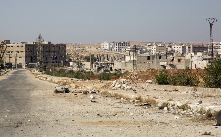 ALEPPO. A general view shows a damaged road and abandoned buildings in Aleppo's rebel-held Kalasa neighbourhood on October 20, 2016. Photo by Karam Al-Masri/ AFP 