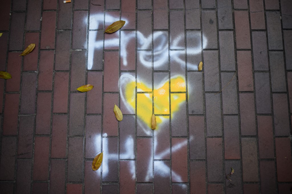FREE. Grafitti which reads 'Free HK' is seen on the ground at the Hong Kong Polytechnic University campus in the Hung Hom district of Hong Kong on November 27, 2019, over a week after police surrounded the building while protesters were still barricaded inside. Photo by Anthony Wallace/AFP 