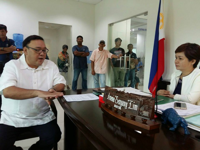 SCARBOROUGH SHOAL. Then Representative Harry Roque briefs a local official in Zambales about his initiatives in Congress for Scarborough Shoal, in this photo posted by the group he co-founded, CenterLaw, on August 12, 2016.  File photo by Romel Bagares, Gilbert Andres, and Thibault Bailly from CenterLaw's Facebook page 