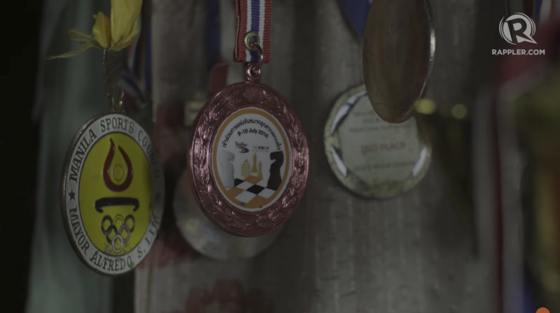 YOUNG PRODIGY. The small house where Magnus Roma and his family live is decorated by medals and trophies the family won from various chess tournaments. Photo by Vee Salazar/Rappler