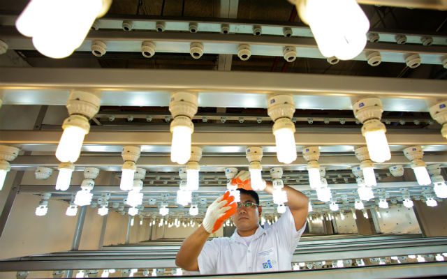 SAVING ENERGY. The ADB funds part of a project that distributed over 10 million compact fluorescent light bulbs and changed most traffic lights to LEDs. File photo by ADB  