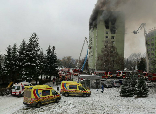 FIRE. This handout picture made available by the Slovak Police on December 6, 2019 shows the emergency services working at the scene of a gas explosion in an apartment building in Presov, eastern Slovakia. Photo from Slovak Police/AFP 