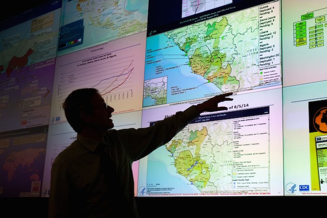 MONITORING THE SPREAD. Dr. Stephan Monroe, deputy director of the national center for emerging and zoonotic infectious diseases, points out areas of Liberia in West Africa that have been affected by Ebola in the Centers for Disease Control and Prevention (CDC) Emergency Operations Center in Atlanta, Georgia, USA, 07 August 2014. Branden Camp/EPA
