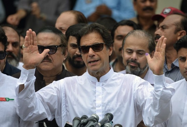 IMRAN KHAN. Pakistan's cricketer-turned politician Imran Khan of the Pakistan Tehreek-e-Insaf is hailed after freeing an Indian pilot amid tensions between Pakistan and India. Photo by Aamir Oureshi/AFP 