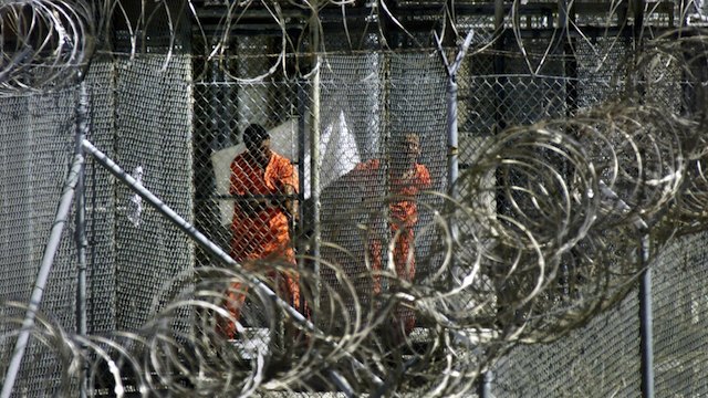 DETAINED. A file photograph showing men dressed in orange coveralls, at the US Naval Base at Guantanamo Bay. J. Scott Applewhite/Pool/EPA 