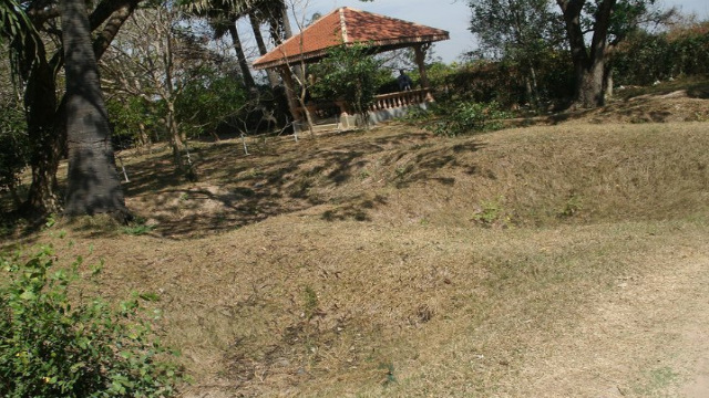LIFELESS. Craters mark the excavation sites of mass graves during the Khmer Rouge regime. Photo contributed by the author