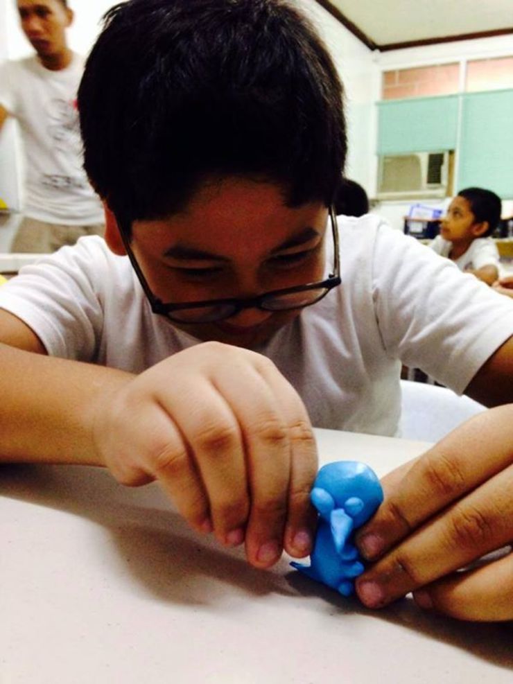 One of A-HA Learning Center's 5th grade students, Kenneth, playing in between study sessions. Photo from A-HA Learning Center Facebook page.