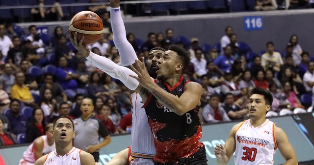 HARD TO TAME. Calvin Abueva flaunts his boundless energy as Phoenix claims solo lead in the standings. Photo from PBA Images  