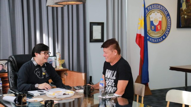 Rico's Lechon owner Enrico Dionson meets with Presidential Assistant for the Visayas Mike Dino. Photo from the Office of the Presidential Assistant for the Visayas.  