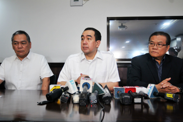 HACKER ARRESTED. Comelec Chairman Andres Bautista (center) on April 21, 2016, presents the suspected hacker of the poll body's website. Hours later, the Comelec draws flak for the huge data leak after the hacking. Photo by Ben Nabong/Rappler 