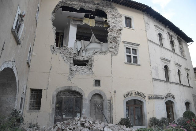 QUAKE. A picture shows a destroyed building in the village of Visso, central Italy, on October 27, 2016. Photo by Tiziana Fabi/ AFP 