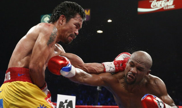 REMATCH. Manny Pacquiao says there's a 'big possibility' he'll face Floyd Mayweather again. Photo by AFP 