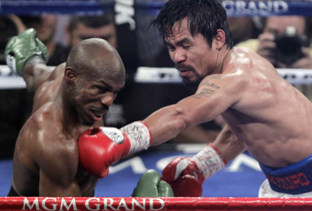 Tim Bradley holds a disputed win in their first fight while Manny Pacquiao won a more competitive rematch. File photo by John Gurzinski/AFP
 