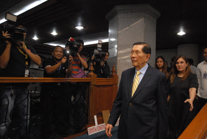 BACK TO WORK. Senator Juan Ponce Enrile attends session after a year in detention 