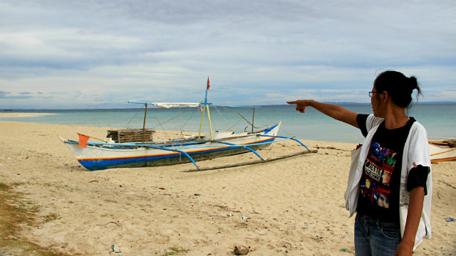 CLEAN AGAIN. Trinidad points to the areas she helped clean during the aftermath of Yolanda.
