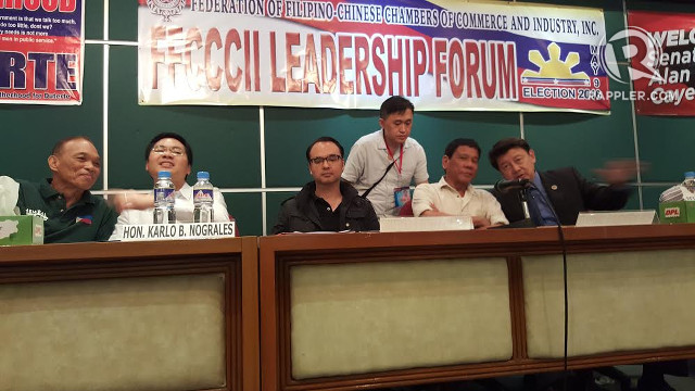 MEN OF DAVAO. Davao City 1st District Representative Karlo Nograles and Davao City Mayor Rodrigo Duterte sit at the same table during a forum with Filipino-Chinese businessmen.  