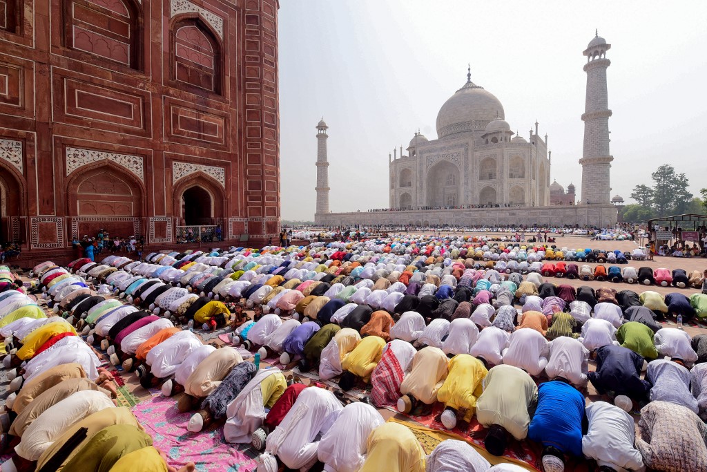 RELIGION. Indian Muslim devotees offer prayers during Eid al-Fitr at the Taj Mahal in Agra on June 5, 2019. File photo by Pawan Sharma/AFP 