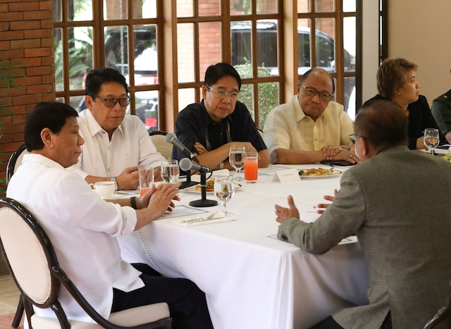 GOVERNMENT PEACE PANEL NO MORE. President Rodrigo Duterte (left), with government peace panel members led by Labor Secretary Silvestre Bello III (2nd, left). File photo from Presidential Photo 
