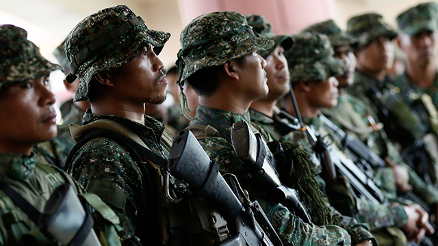 STANDING GUARD. Filipino soldiers man a temporary military camp in Mindanao. File photo by Ritchie B. Tongo/EPA   