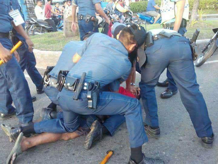 ARREST. Eduardo Serino Sr during his arrest by Zamboanga City police at RT Lim Boulevard. Photo courtesy of Rosherl Taburnal Lumpapac 