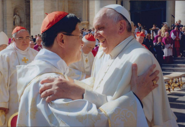 OLD FRIENDS. Pope Francis (right) greets Manila Archbishop Luis Antonio Cardinal Tagle (left) in St Peter's Square, Vatican City, in October 2014. File photo courtesy of Fr Yulito Ignacio