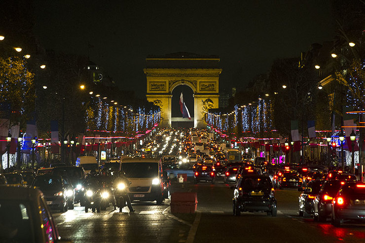 CITY OF LIGHT. Paris moves at the speed of light, life goes on. Photo by Etienne Laurent/EPA