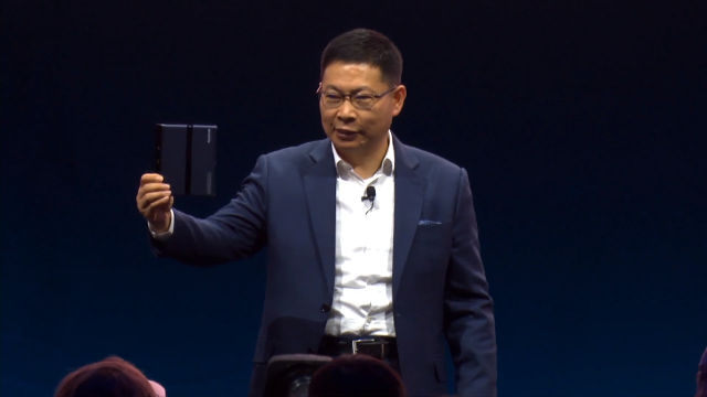 FOLDING PHONE. Huawei CEO Richard Yu shows of the Mate X. Screenshot from livestream 