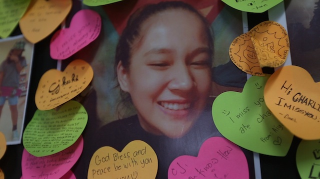 GONE AT 15. Messages from friends and family surround one of the photos of Charlie Jean Du at her wake 