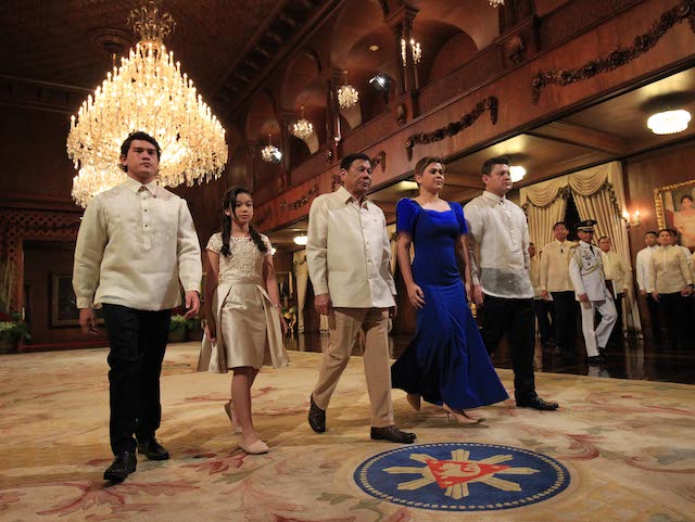 THE PRESIDENT AND HIS CHILDREN. President Rodrigo Duterte (center) heads to the Palace Rizal Hall for his oath taking, flanked by his children (L-R) Sebastian, Veronica, Sara, and Paolo. Photo from EDP-Malacanang  